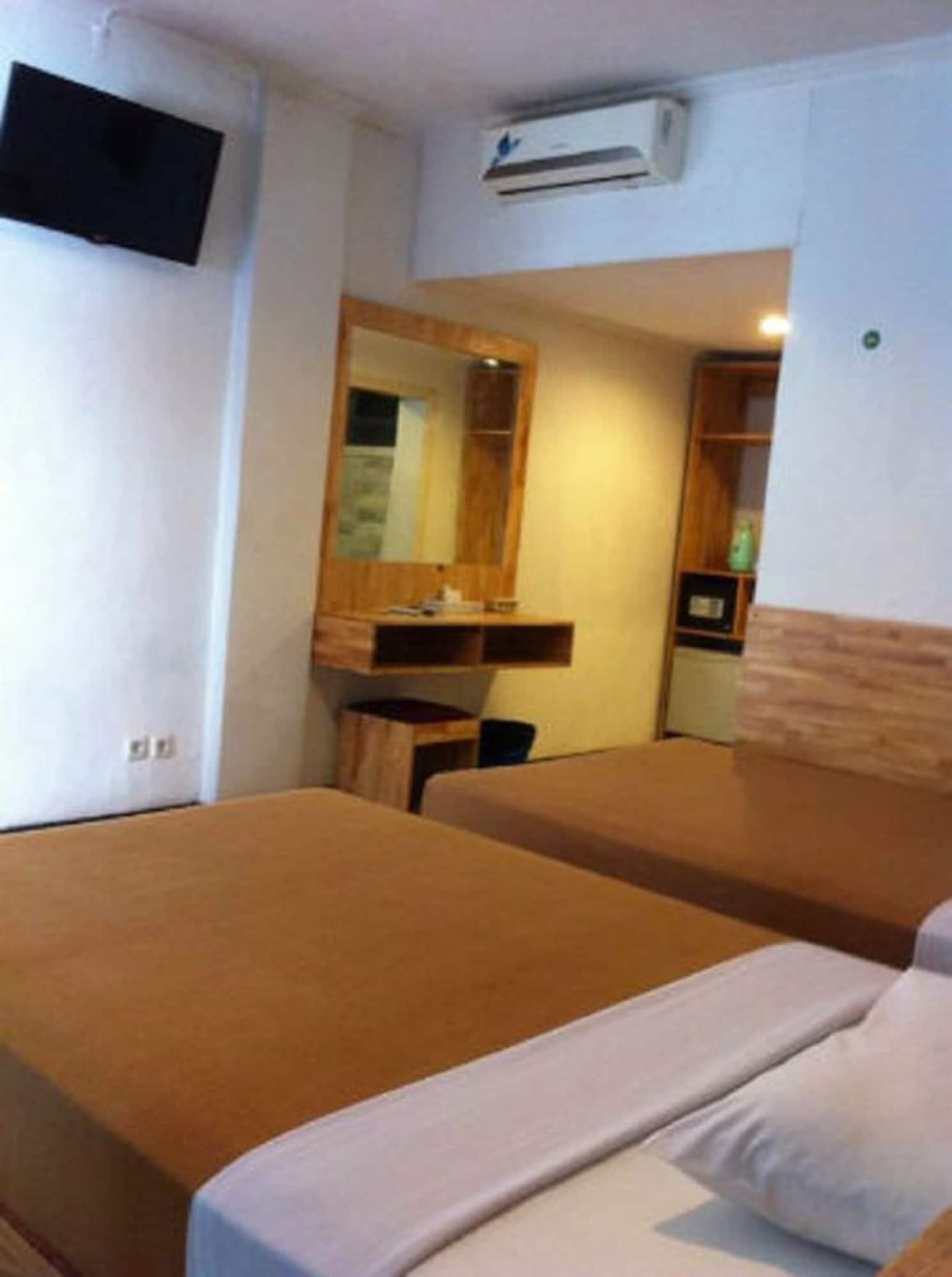 Hotel Karthi Kuta Кута Экстерьер фото